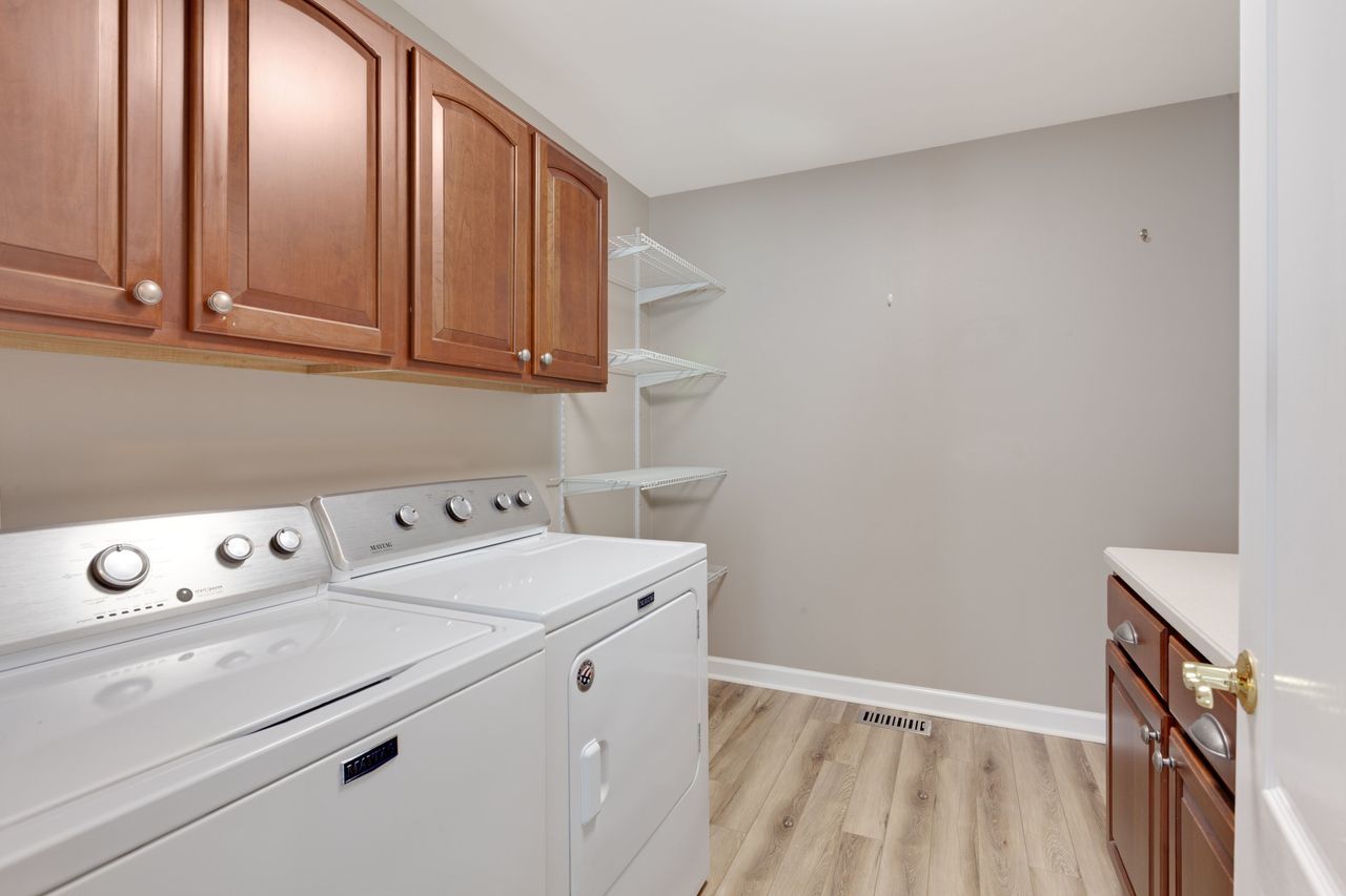 2805 Cattail Court, Unit D Wauconda, IL 60084 - Photo 20 of 30 a utility room with dryer and washer