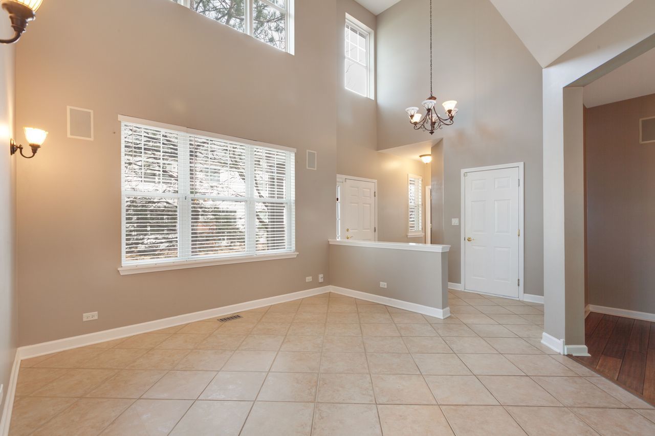 2805 Cattail Court, Unit D Wauconda, IL 60084 - Photo 3 of 30 a view of an empty room with a window
