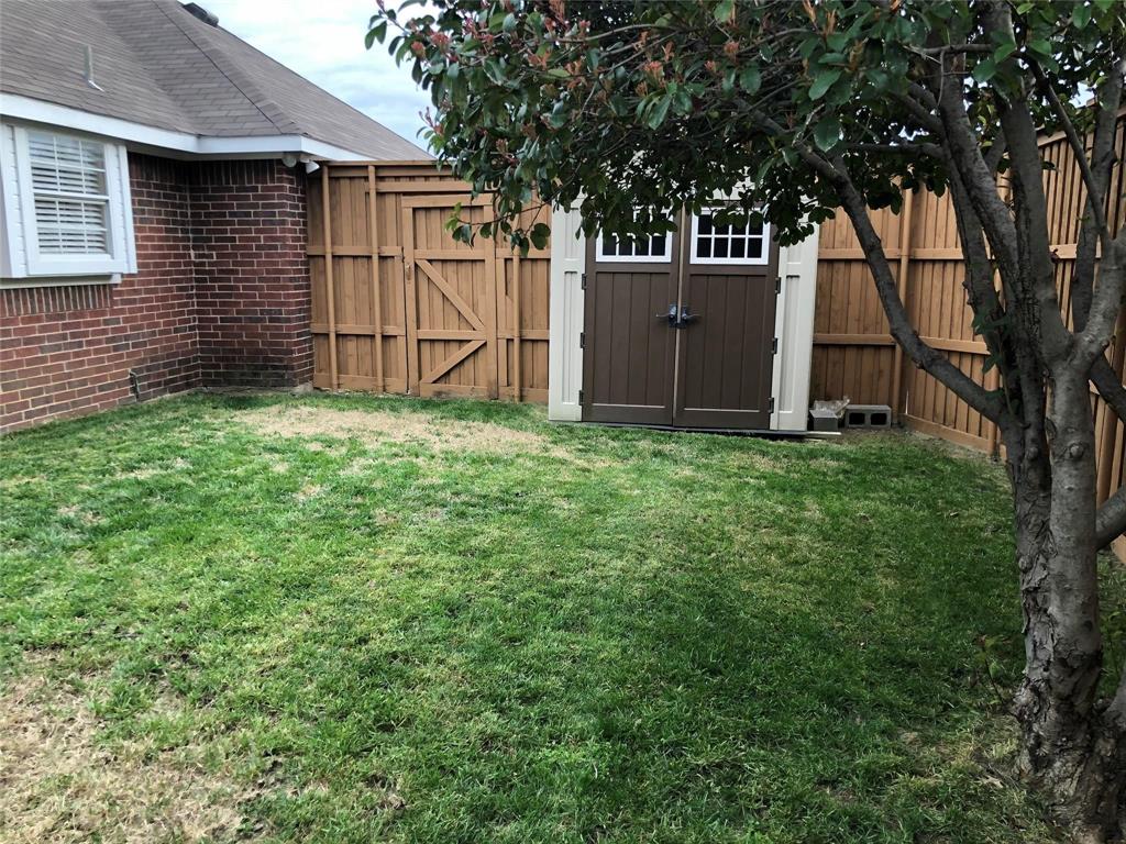 8301 Bells Street Frisco, TX 75035 - Photo 23 of 24 a view of a backyard