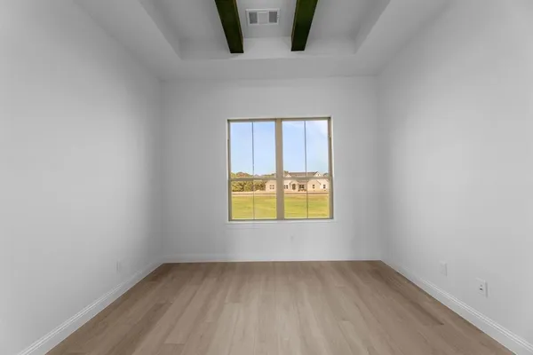 an empty room with windows