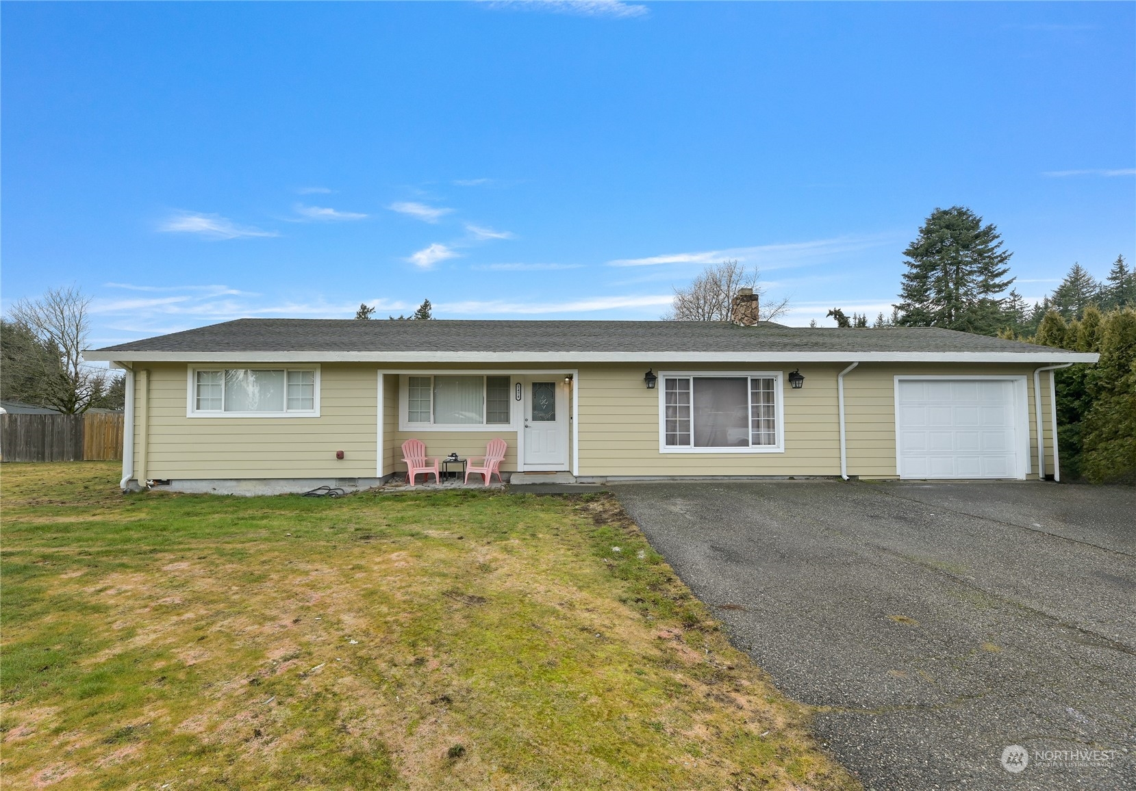 1474 Crestview Road Ferndale, WA 98248 - Photo 1 of 30 a view of a yard in front of a house with a large tree