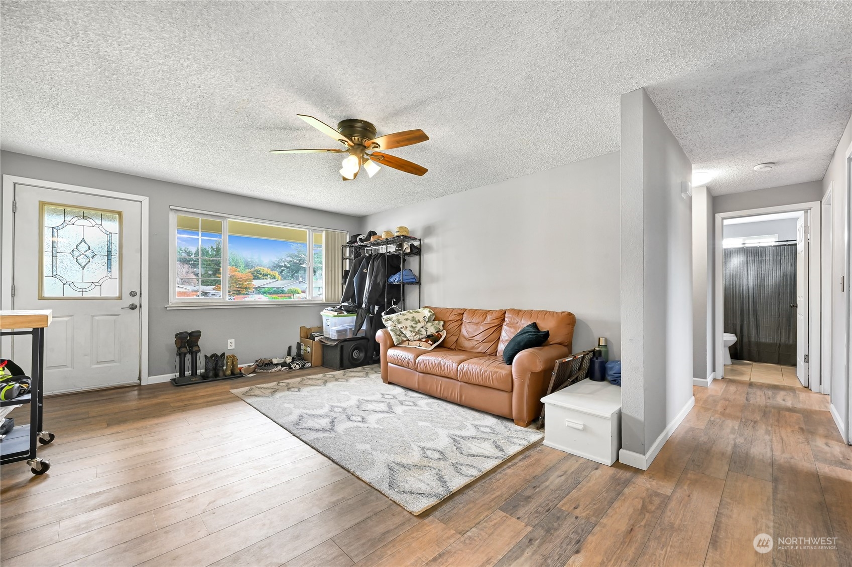 1474 Crestview Road Ferndale, WA 98248 - Photo 5 of 30 a living room with furniture and a flat screen tv