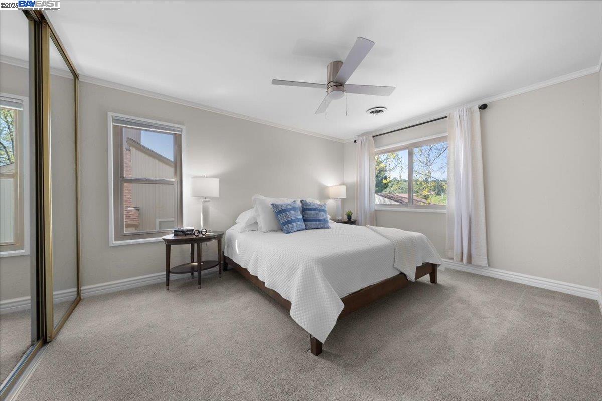 427 Chalda Way Moraga, CA 94556 - Photo 8 of 28 Luxurious, spa-inspired bedroom with multiple oversized mirrored door closets.