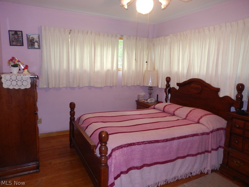 4516 Everett Road Akron, OH 44333 - Photo 9 of 24 Master Bedroom with Hardwood Floors