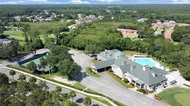 an aerial view of a house with a garden