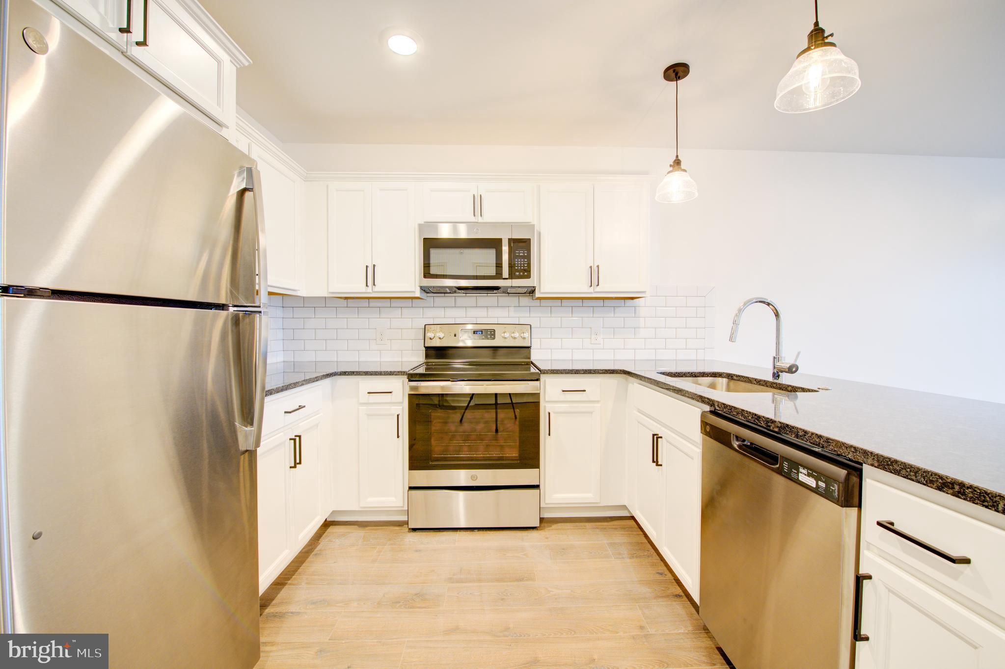 6649 Ridge Avenue, Unit B305 Philadelphia, PA 19128 - Photo 2 of 14