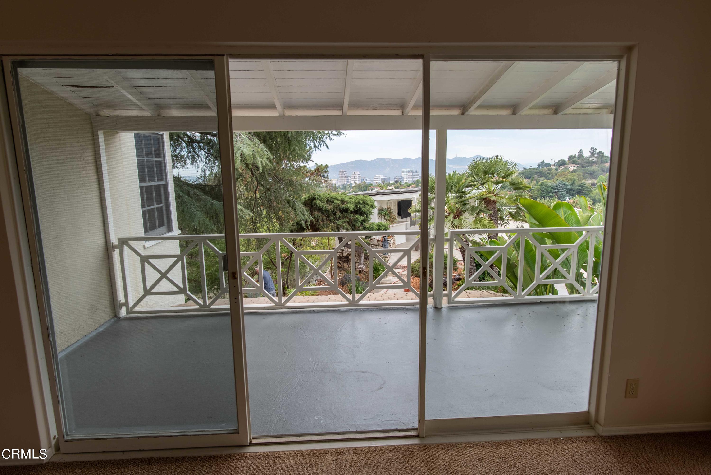 1521 Roca Drive Glendale, CA 91207 - Photo 11 of 54 a view of a glass door with a view from a window