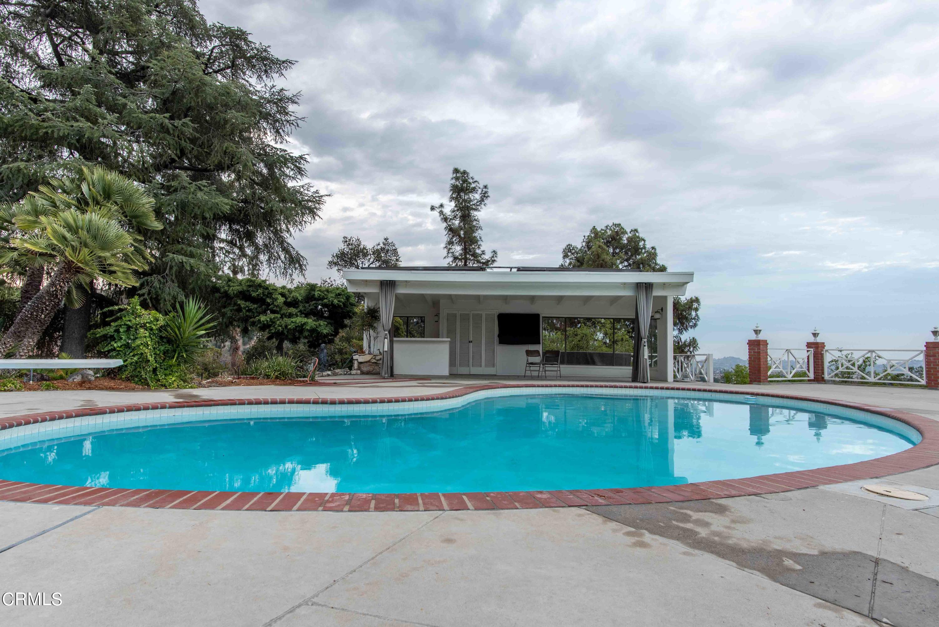 1521 Roca Drive Glendale, CA 91207 - Photo 19 of 54 a view of pool with outdoor seating
