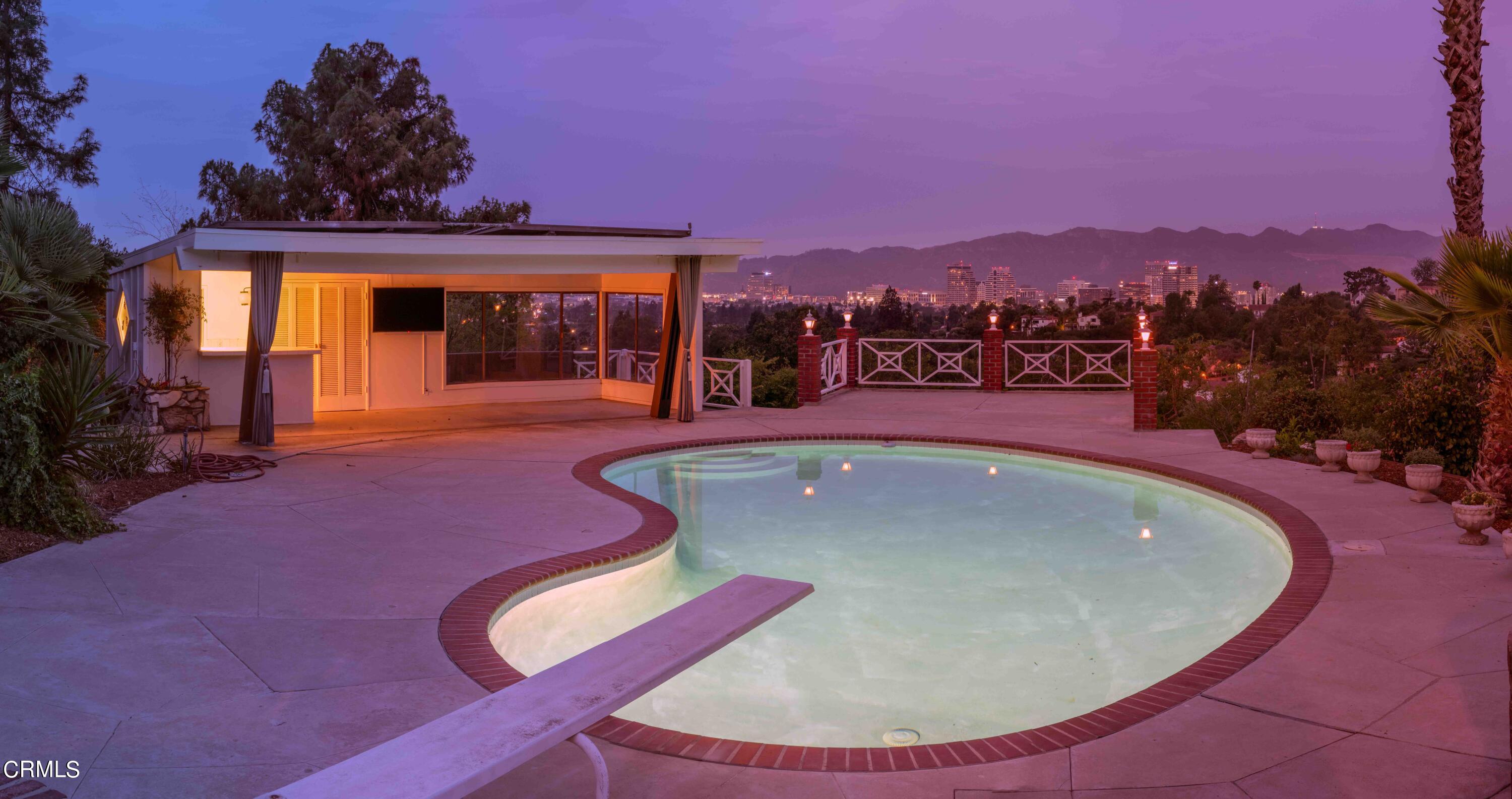 1521 Roca Drive Glendale, CA 91207 - Photo 21 of 54 a view of a swimming pool with a patio