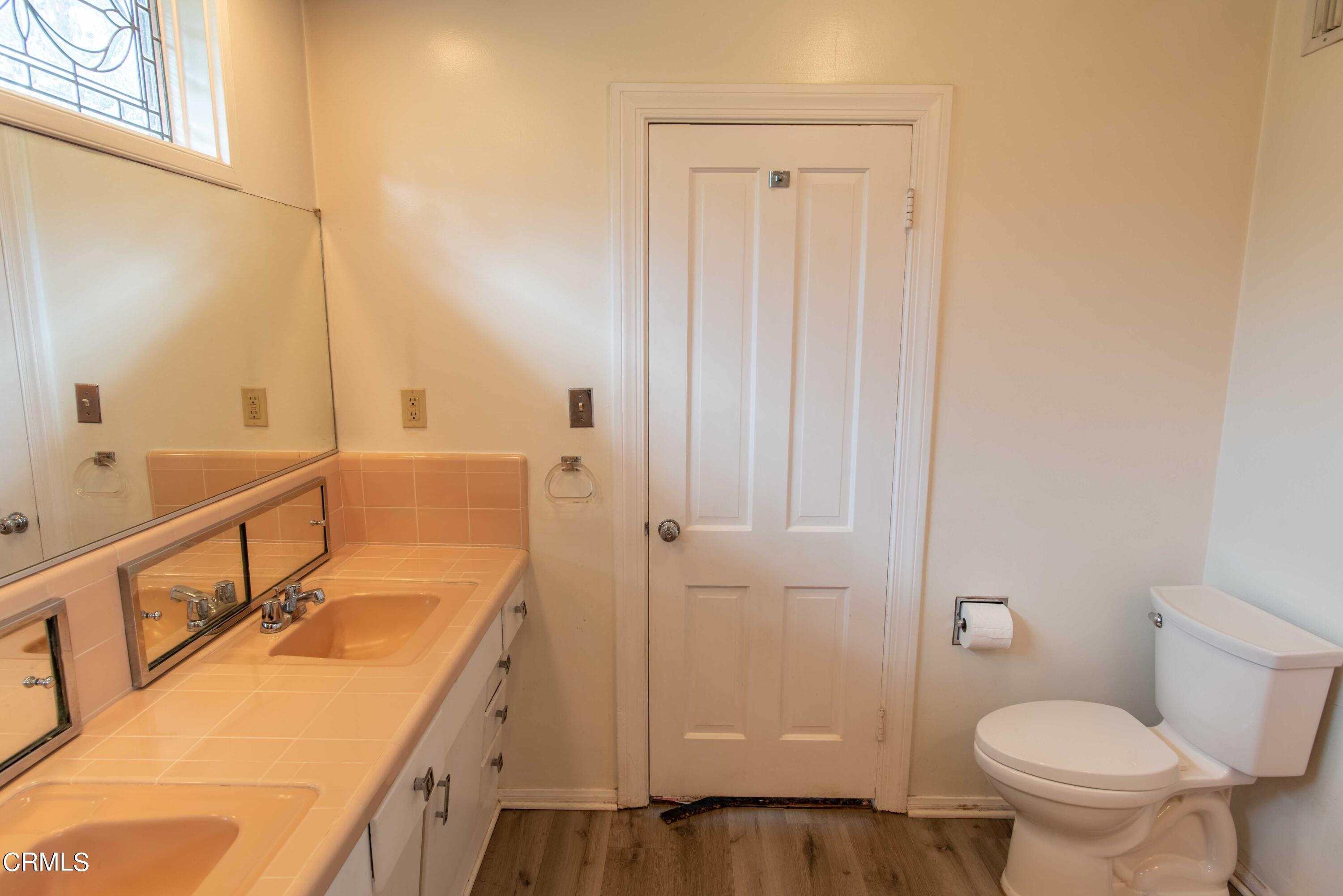 1521 Roca Drive Glendale, CA 91207 - Photo 38 of 54 a bathroom with a sink a toilet and shower
