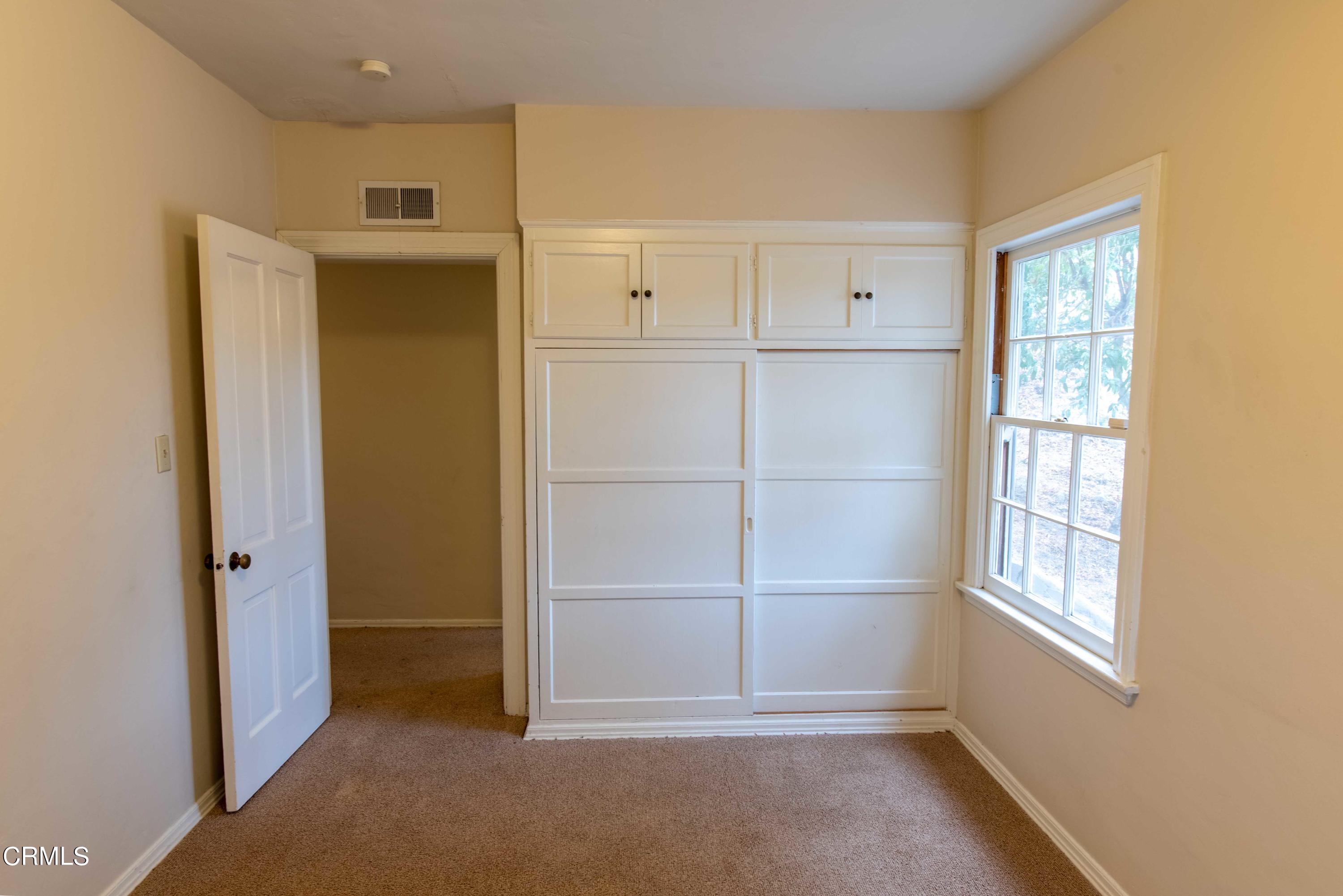 1521 Roca Drive Glendale, CA 91207 - Photo 46 of 54 a view of an empty room with a window