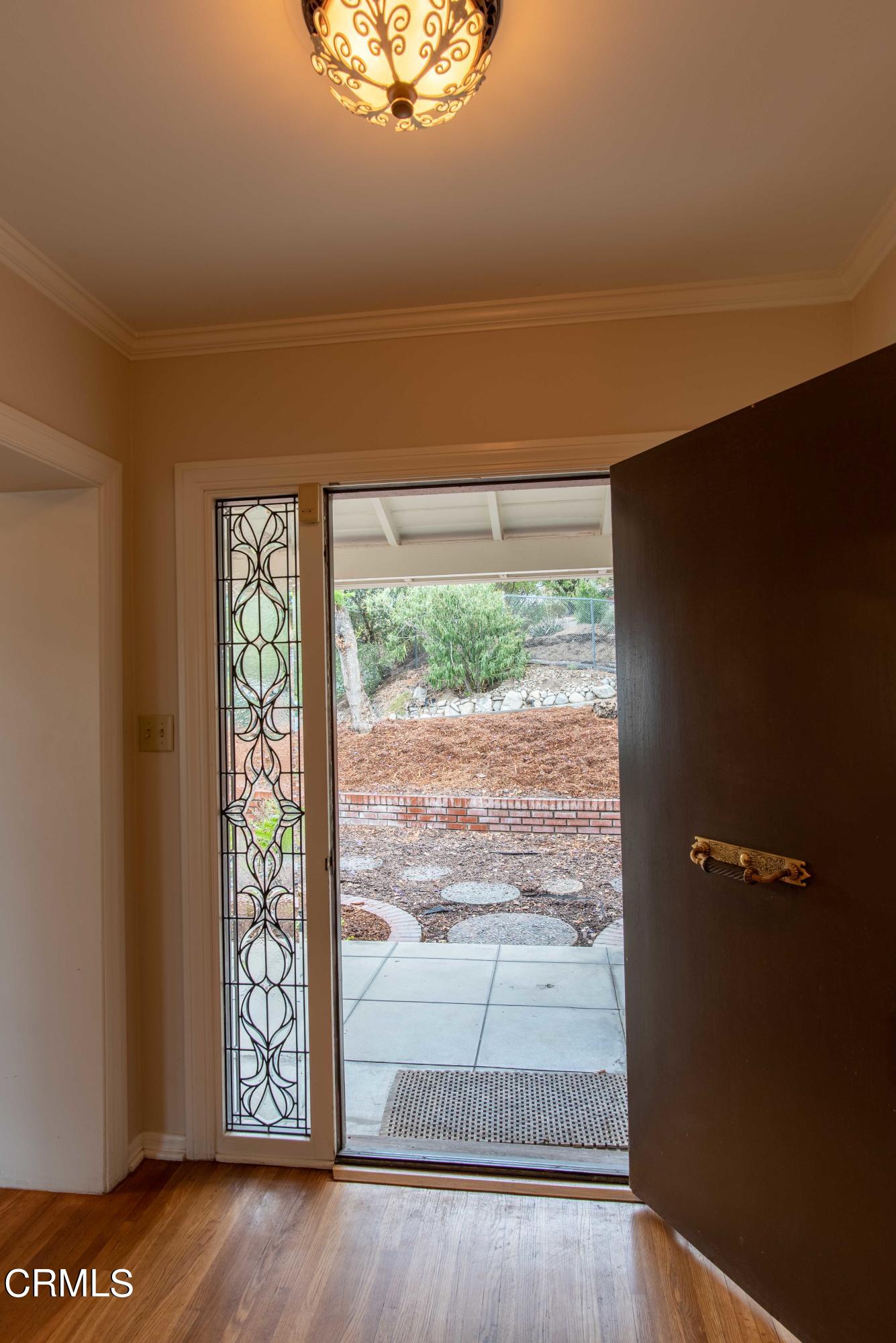 1521 Roca Drive Glendale, CA 91207 - Photo 6 of 54 a view of a room with wooden floor and a window
