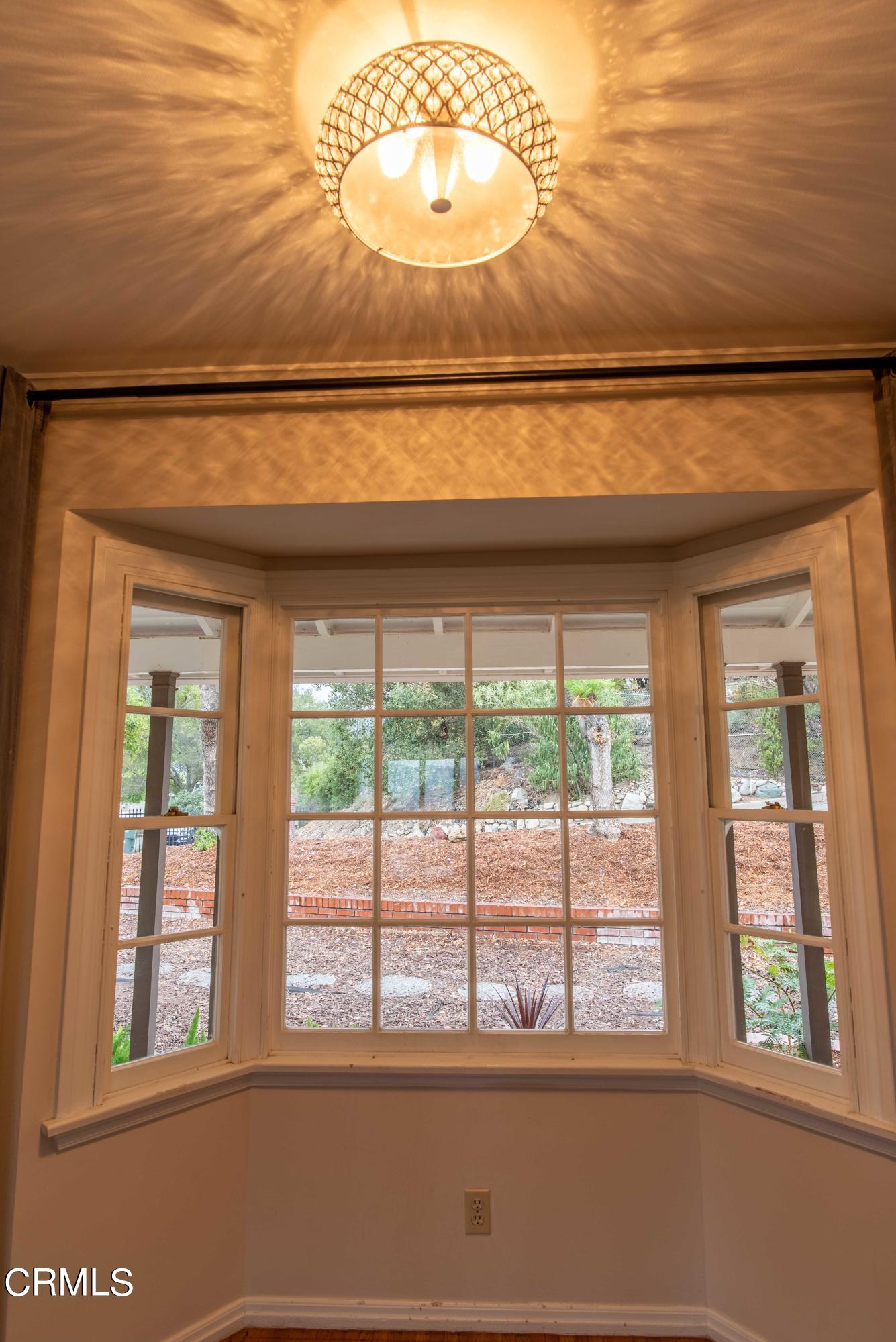 1521 Roca Drive Glendale, CA 91207 - Photo 10 of 54 a front view of a house with a large window