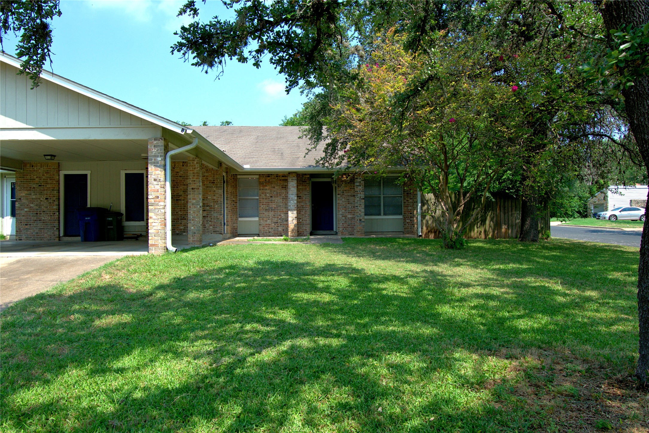 6200 Soft Wind Circle, Unit B Austin, TX 78745 - Photo 1 of 1 a view of a house with a yard and tree
