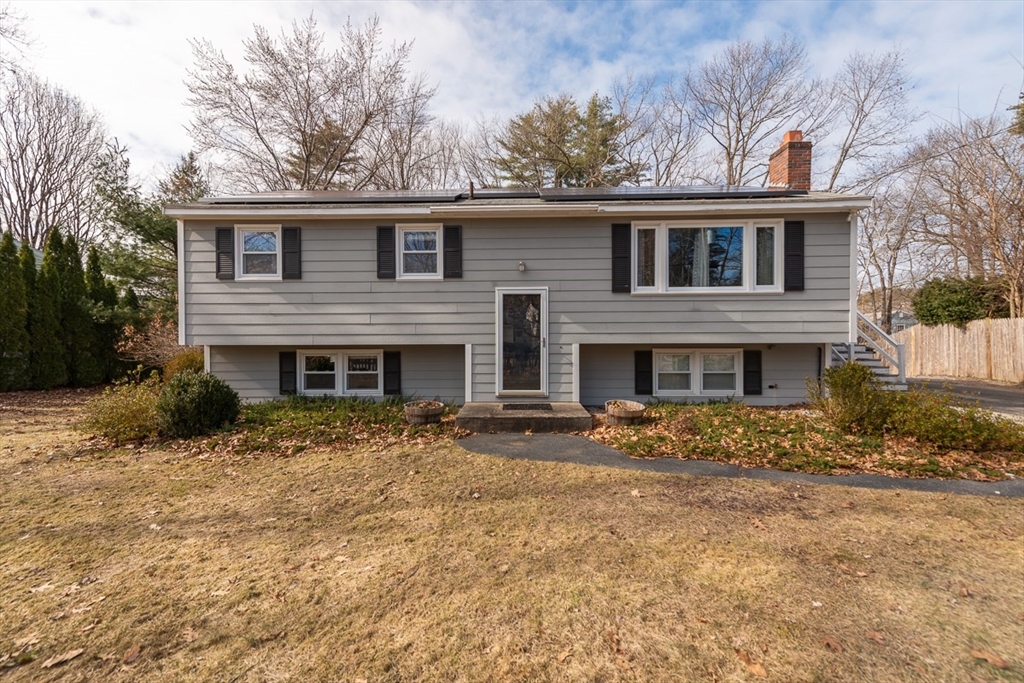 30 Haskell Road Pepperell, MA 01463 - Photo 1 of 30 a front view of a house with a yard
