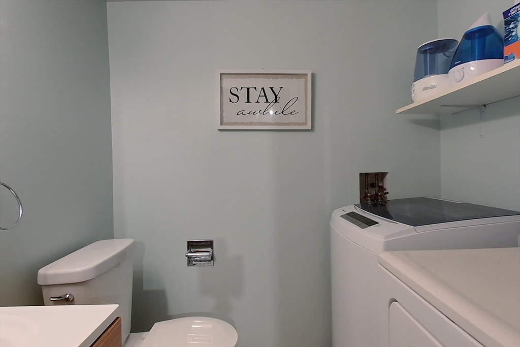 30 Haskell Road Pepperell, MA 01463 - Photo 23 of 30 a bathroom with a toilet a sink and mirror