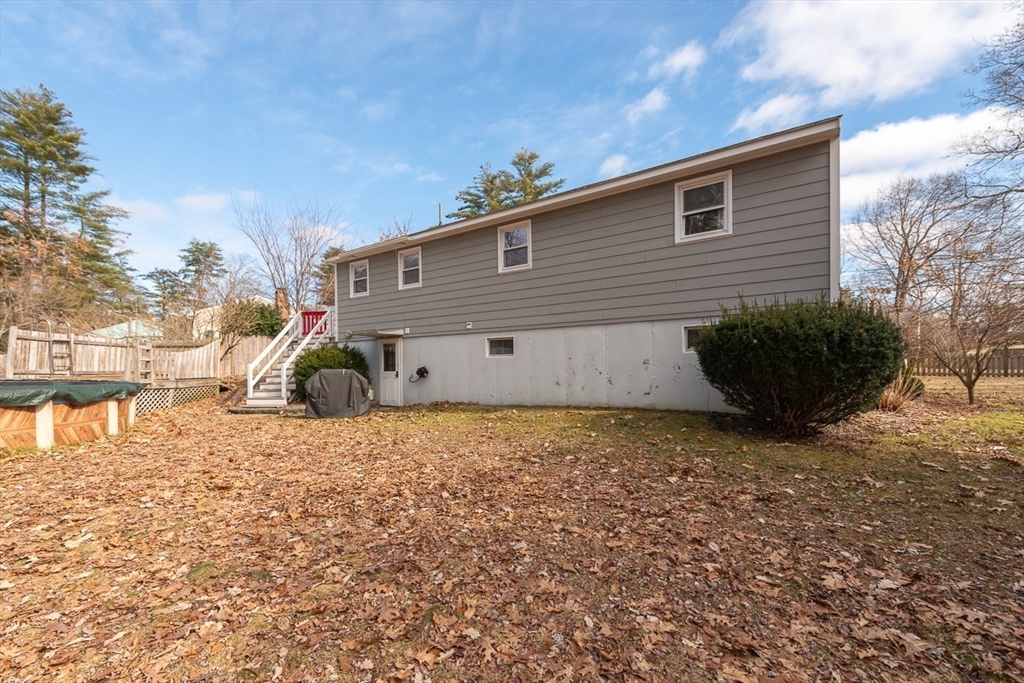 30 Haskell Road Pepperell, MA 01463 - Photo 26 of 30 a view of a house with a backyard