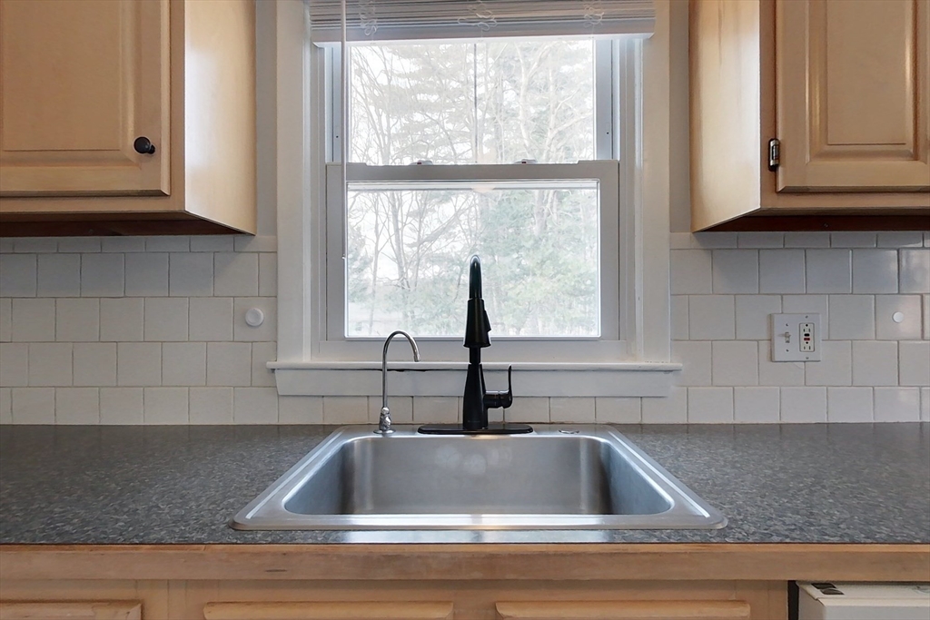 30 Haskell Road Pepperell, MA 01463 - Photo 3 of 30 a kitchen with sink and cabinets