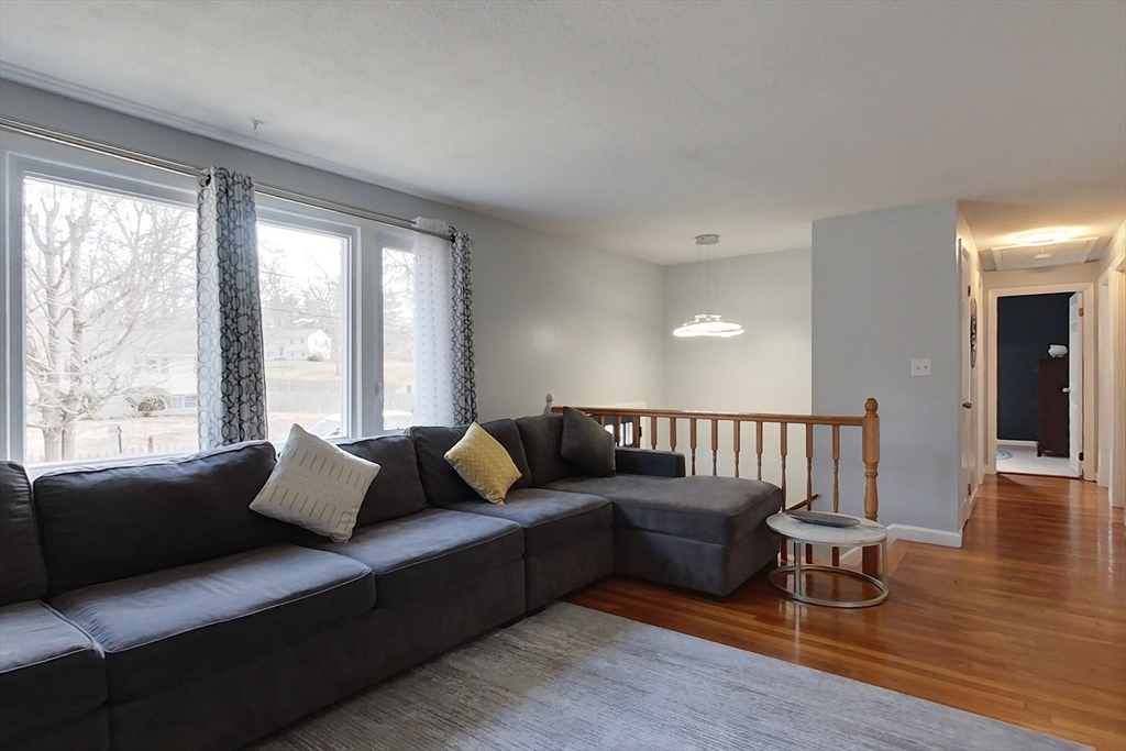 30 Haskell Road Pepperell, MA 01463 - Photo 9 of 30 a living room with furniture and a large window