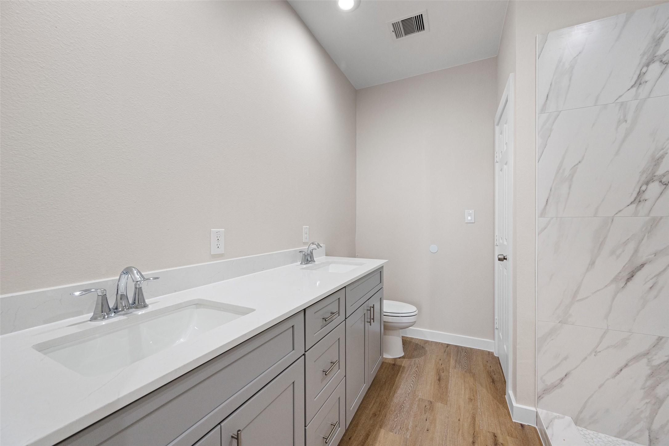 9409 Clinton Drive, Unit A Houston, TX 77029 - Photo 15 of 28 a bathroom with a sink and a toilet