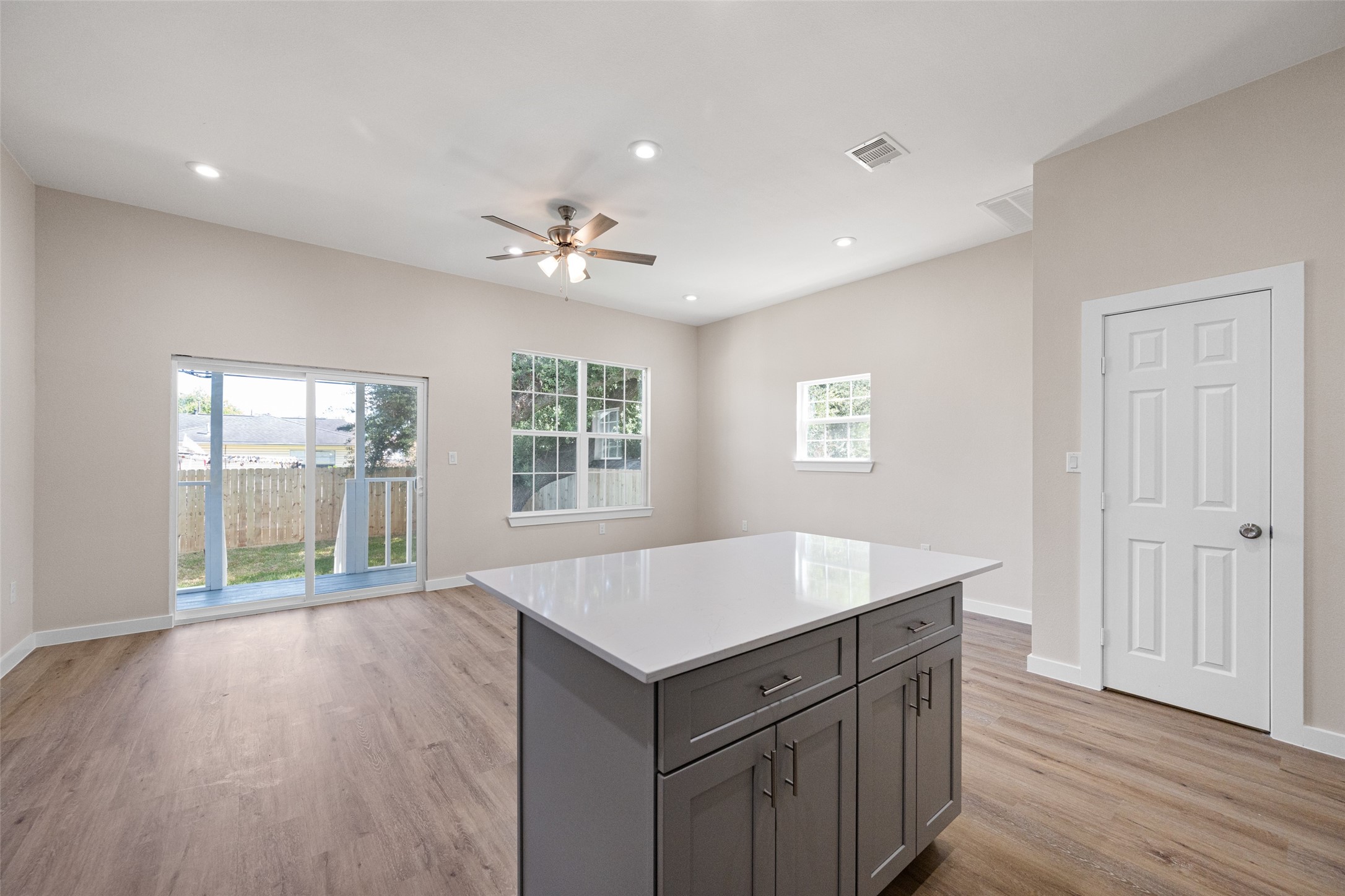 9409 Clinton Drive, Unit A Houston, TX 77029 - Photo 9 of 28 a living room with wooden floors and floors