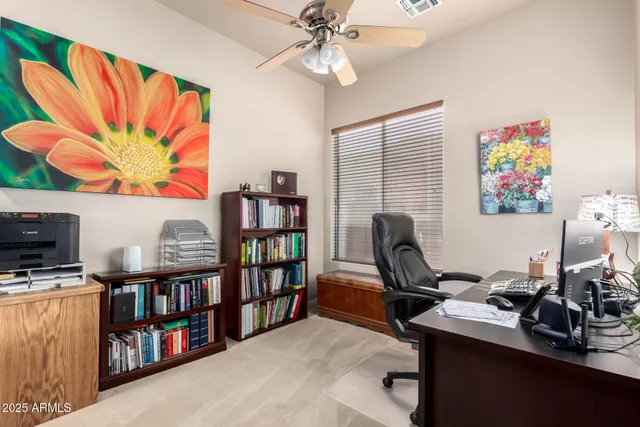 a spacious bedroom with a bed and a window