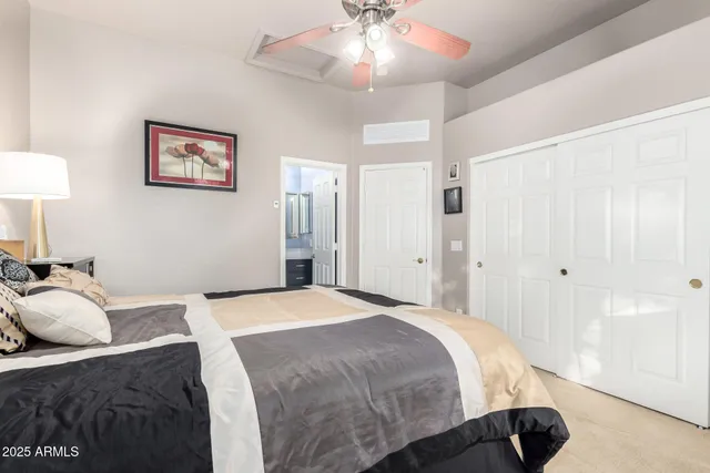 a bathroom with a granite countertop sink mirror toilet and shower