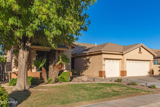 a view of a house with basketball court