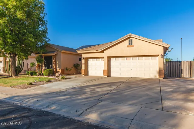 a view of a two chairs in the balcony