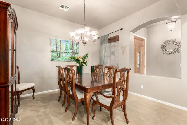 a bathroom with a double vanity sink mirror and shower