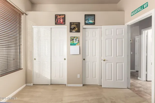 a view of a park with a tree in it