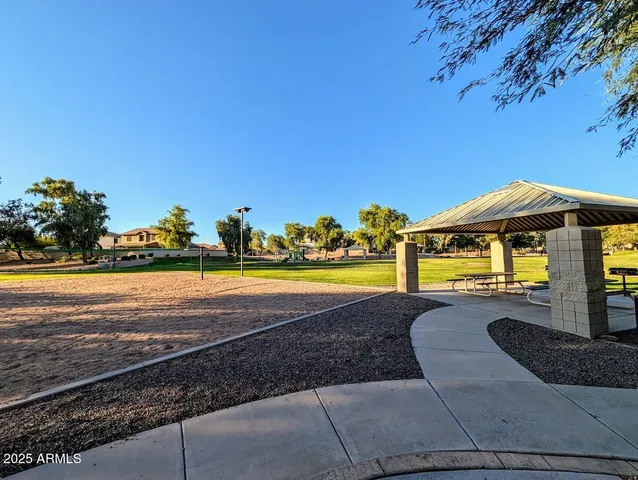 a aerial view of a house with swimming pool and porch