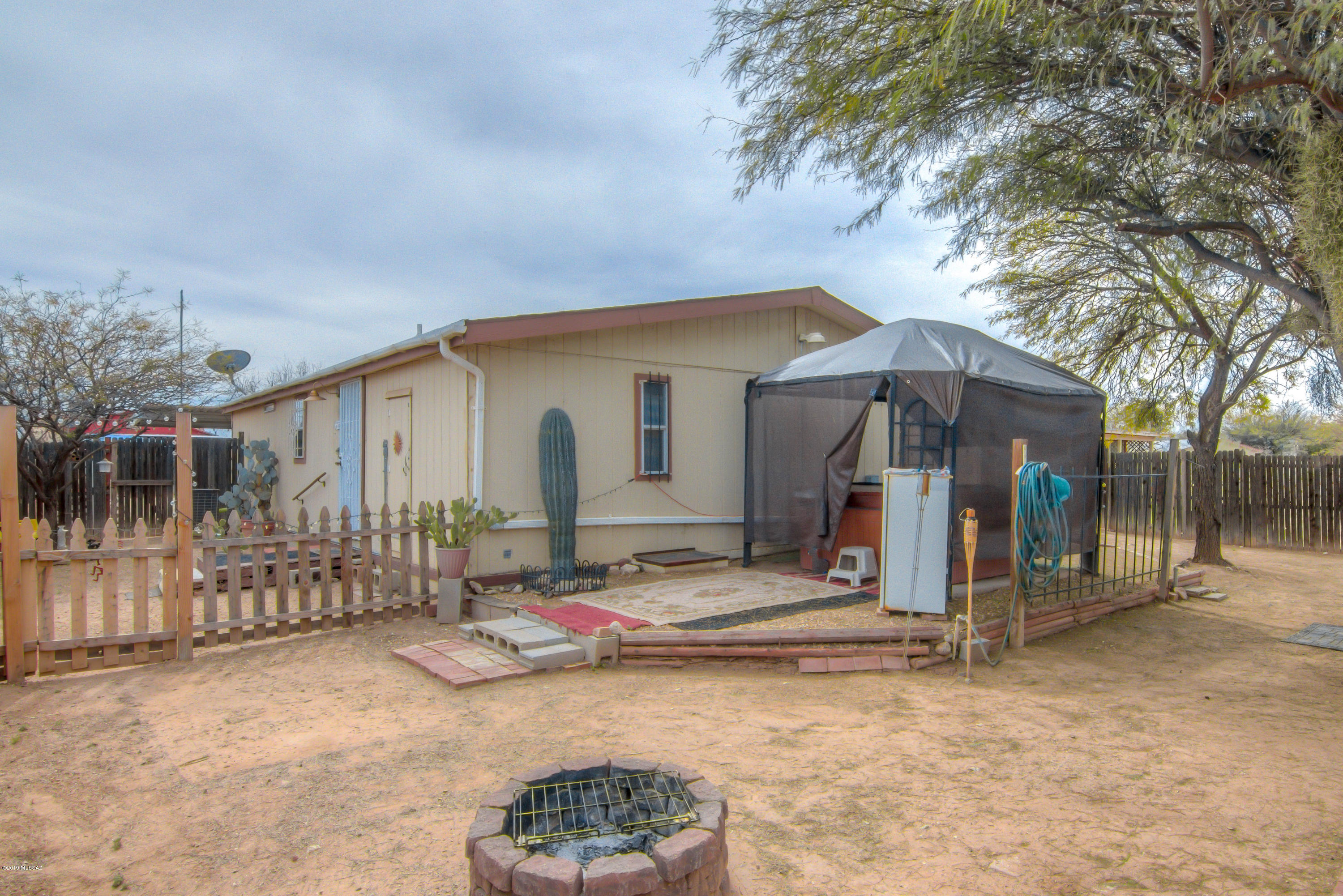 263 East Roger Road Tucson, AZ 85705 - Photo 29 of 31 a view of a house with a snow on the road