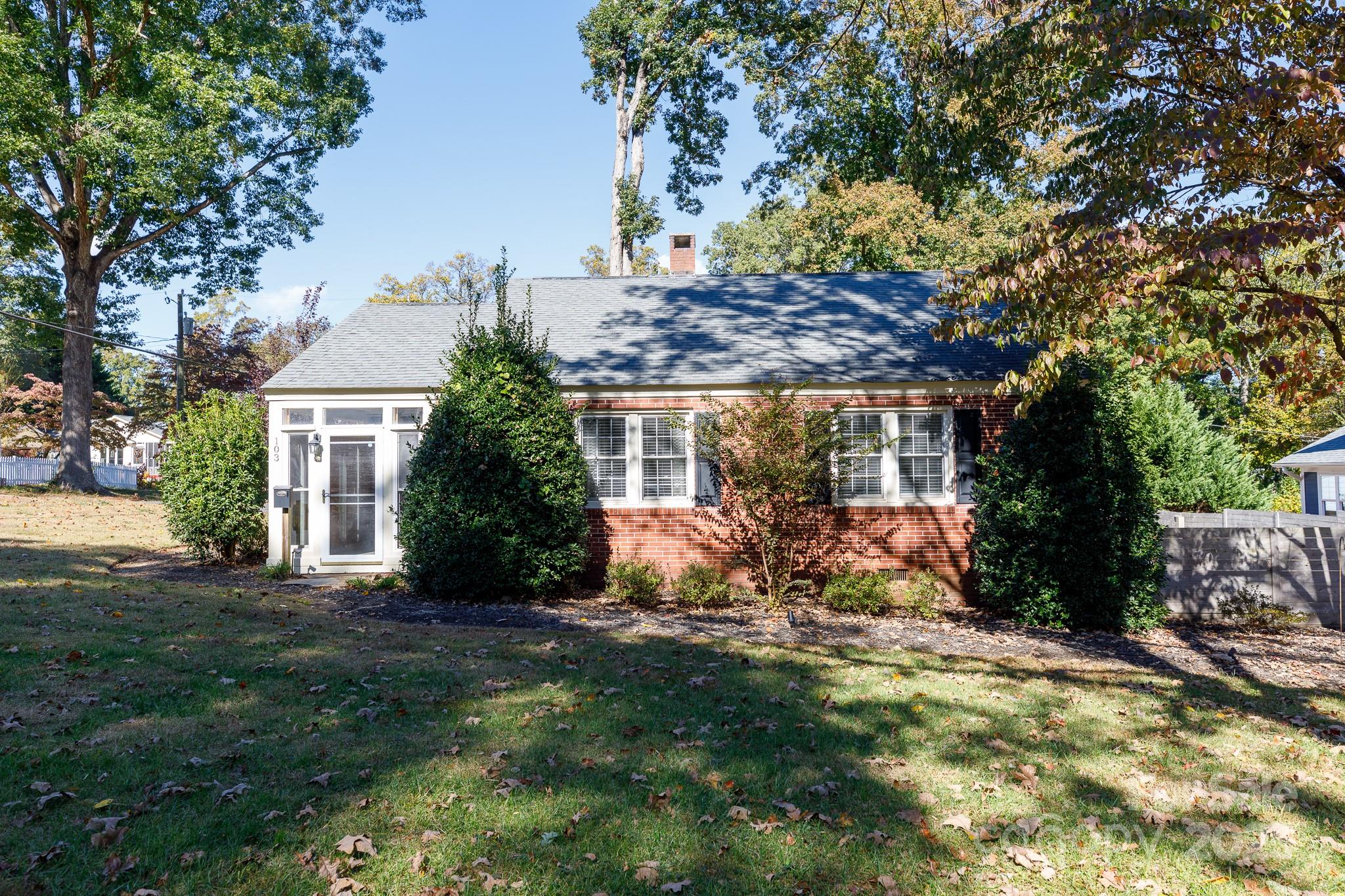 103 East Gregg Street Fort Mill, SC 29715 - Photo 31 of 47 a front view of a house with garden