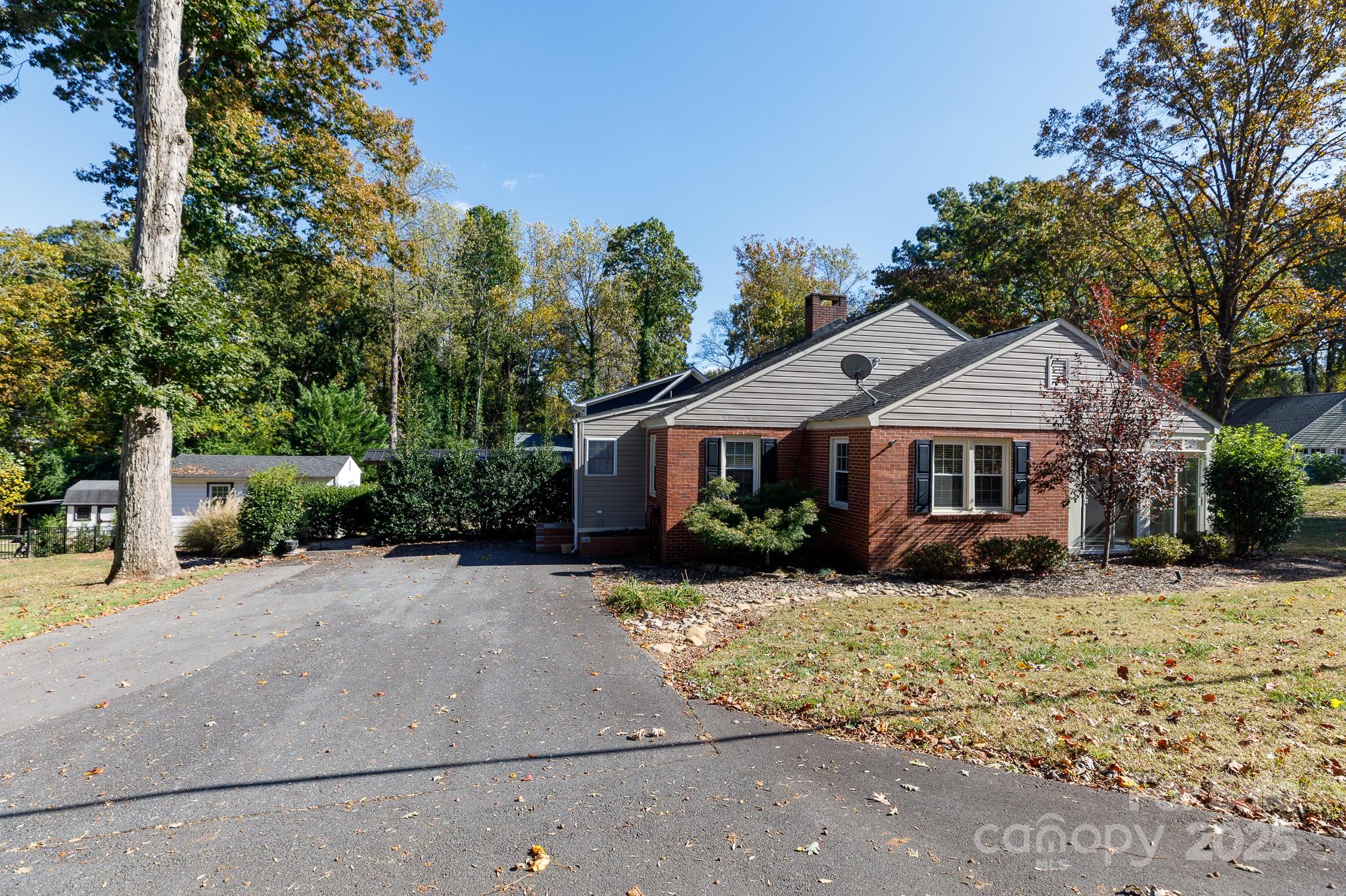 103 East Gregg Street Fort Mill, SC 29715 - Photo 39 of 47 a front view of a house with a yard