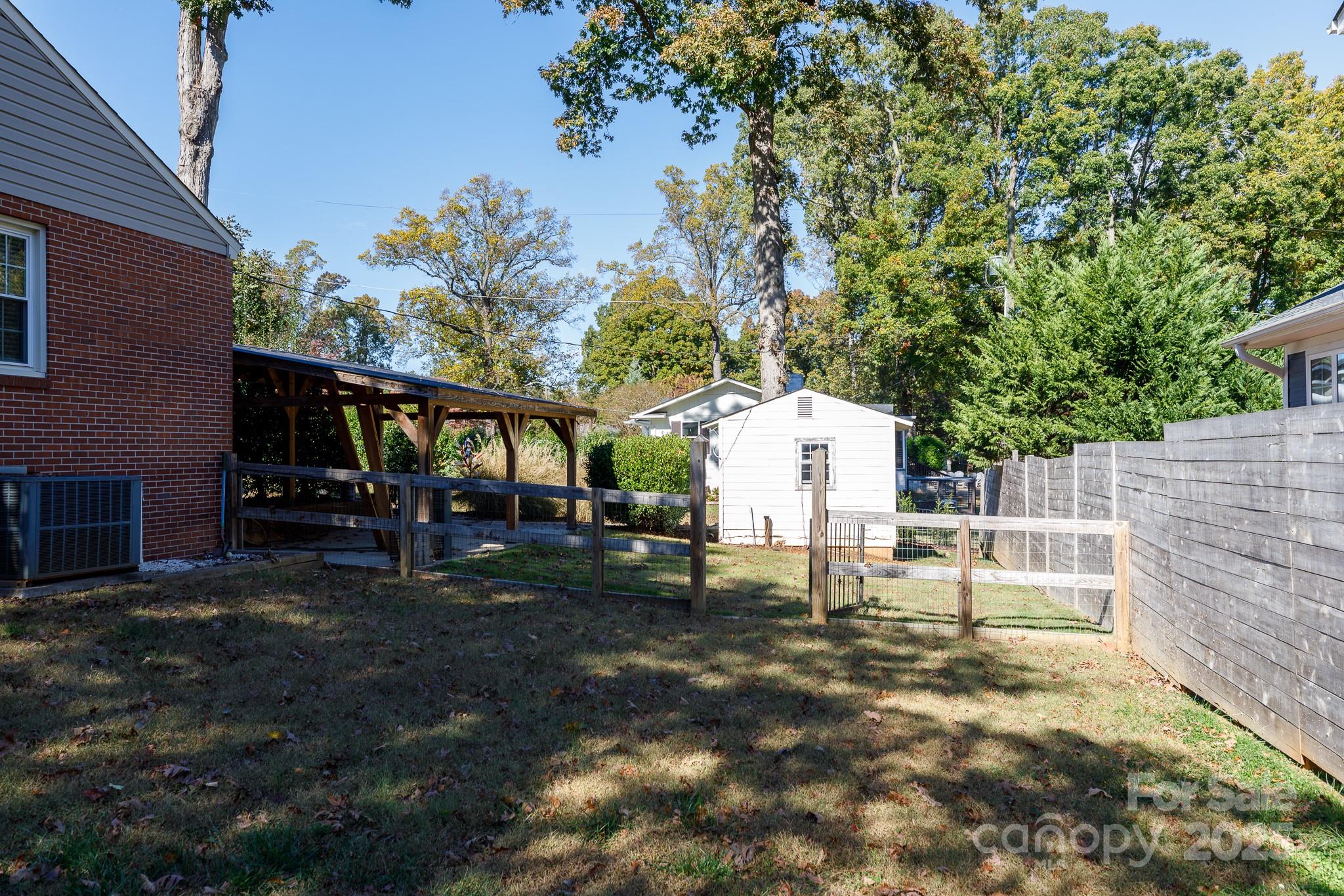 103 East Gregg Street Fort Mill, SC 29715 - Photo 46 of 47 a view of house with backyard and furniture