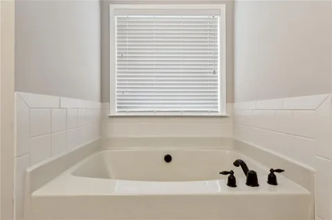 a bathroom with a bathtub