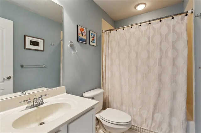 a bathroom with a sink and a toilet