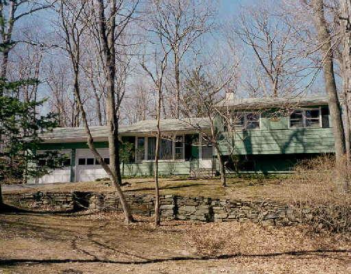 82 Bob Hill Road Ridgefield, CT 06877 - Photo 1 of 1 a backyard of a house with barbeque oven