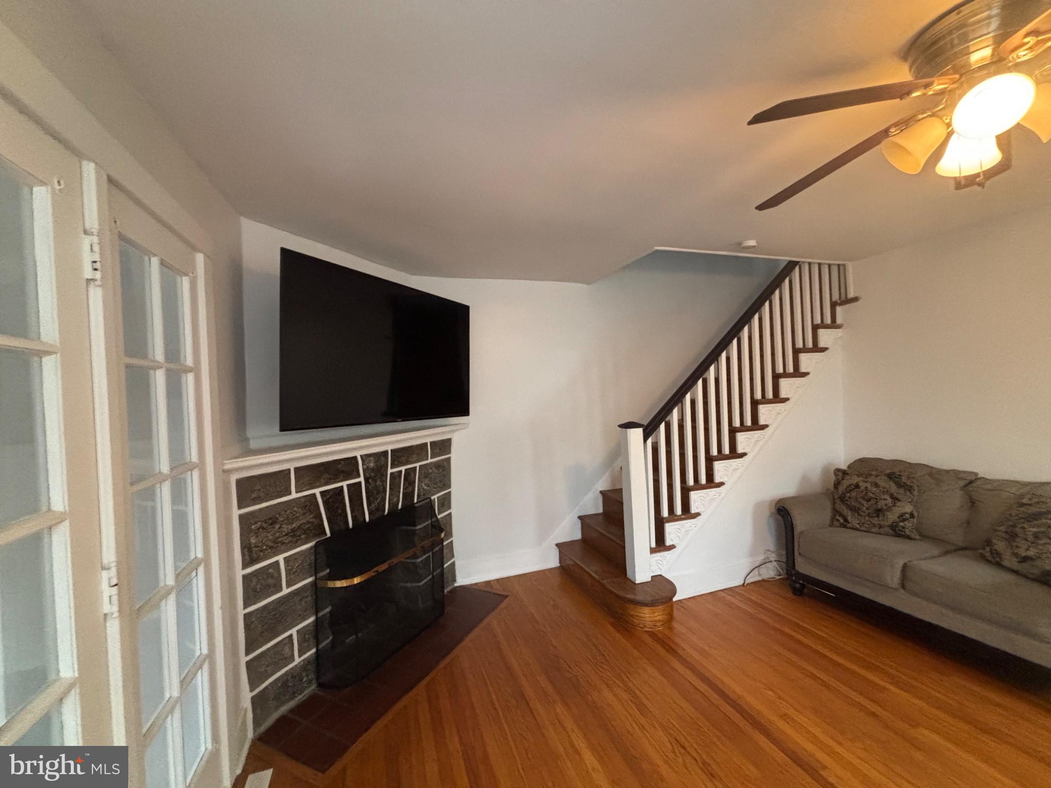 4101 Vernon Road Drexel Hill, PA 19026 - Photo 4 of 26 Cozy living space with modern charm.