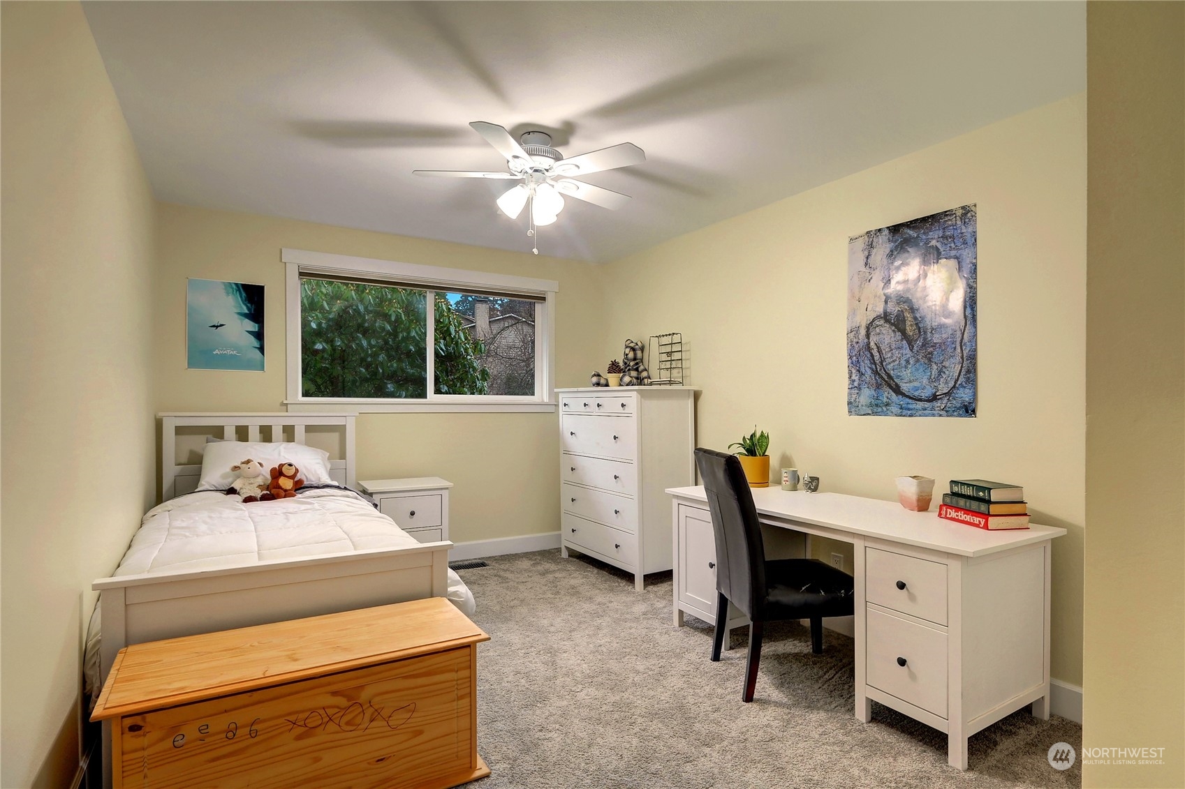 120 219th Place Southwest Bothell, WA 98021 - Photo 12 of 20 a bedroom with a bed and a chandelier