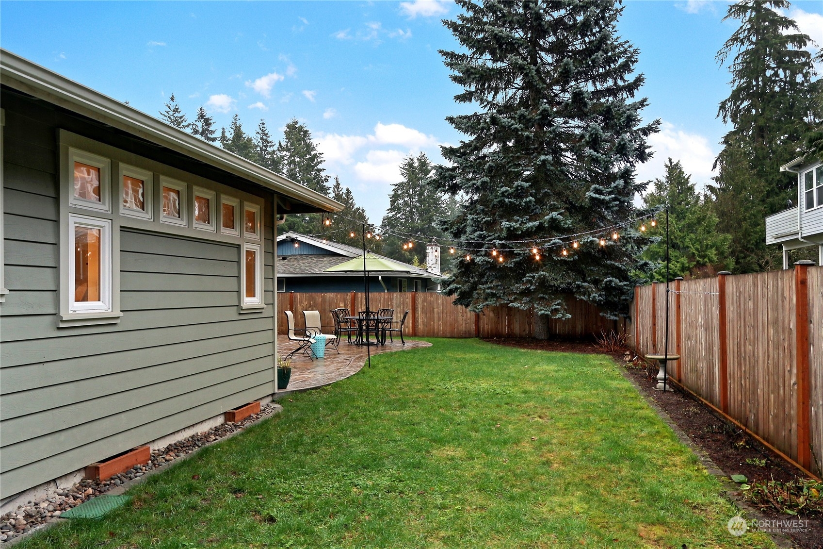 120 219th Place Southwest Bothell, WA 98021 - Photo 18 of 20 a view of a house with a yard