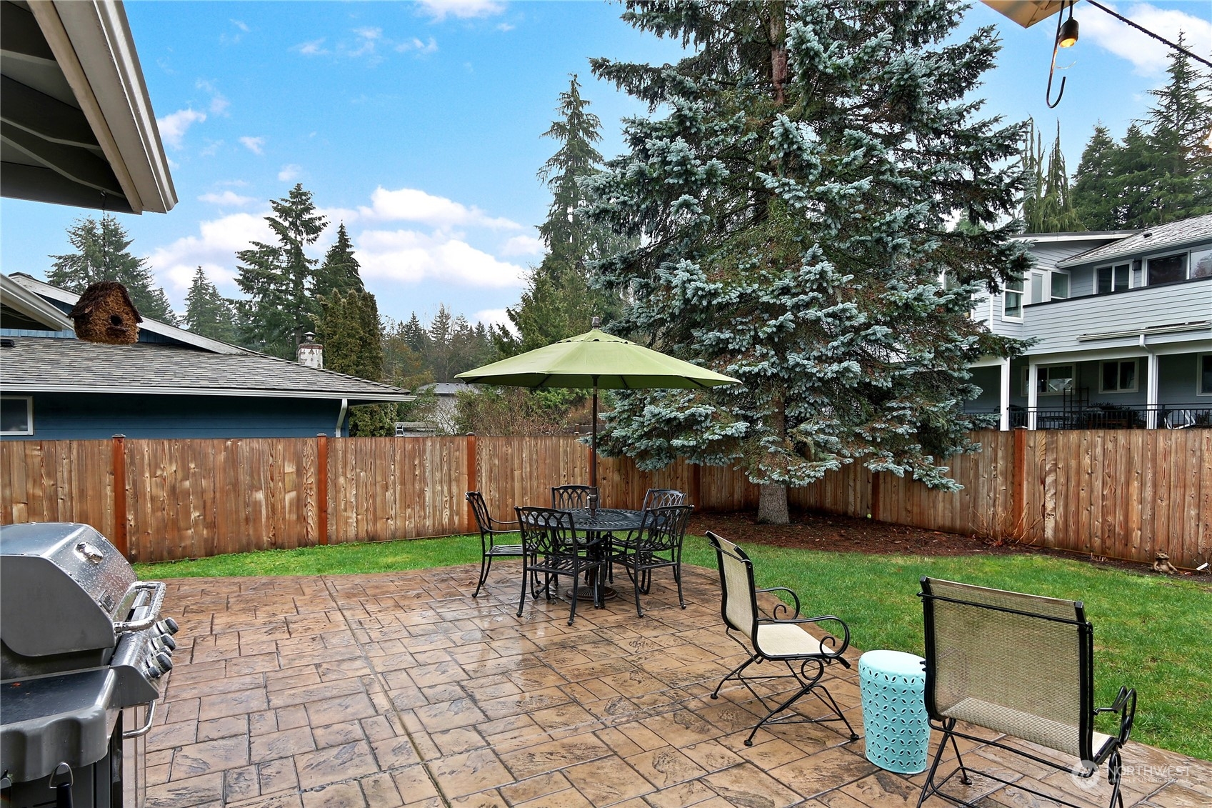 120 219th Place Southwest Bothell, WA 98021 - Photo 19 of 20 a view of backyard with outdoor seating a patio and plants
