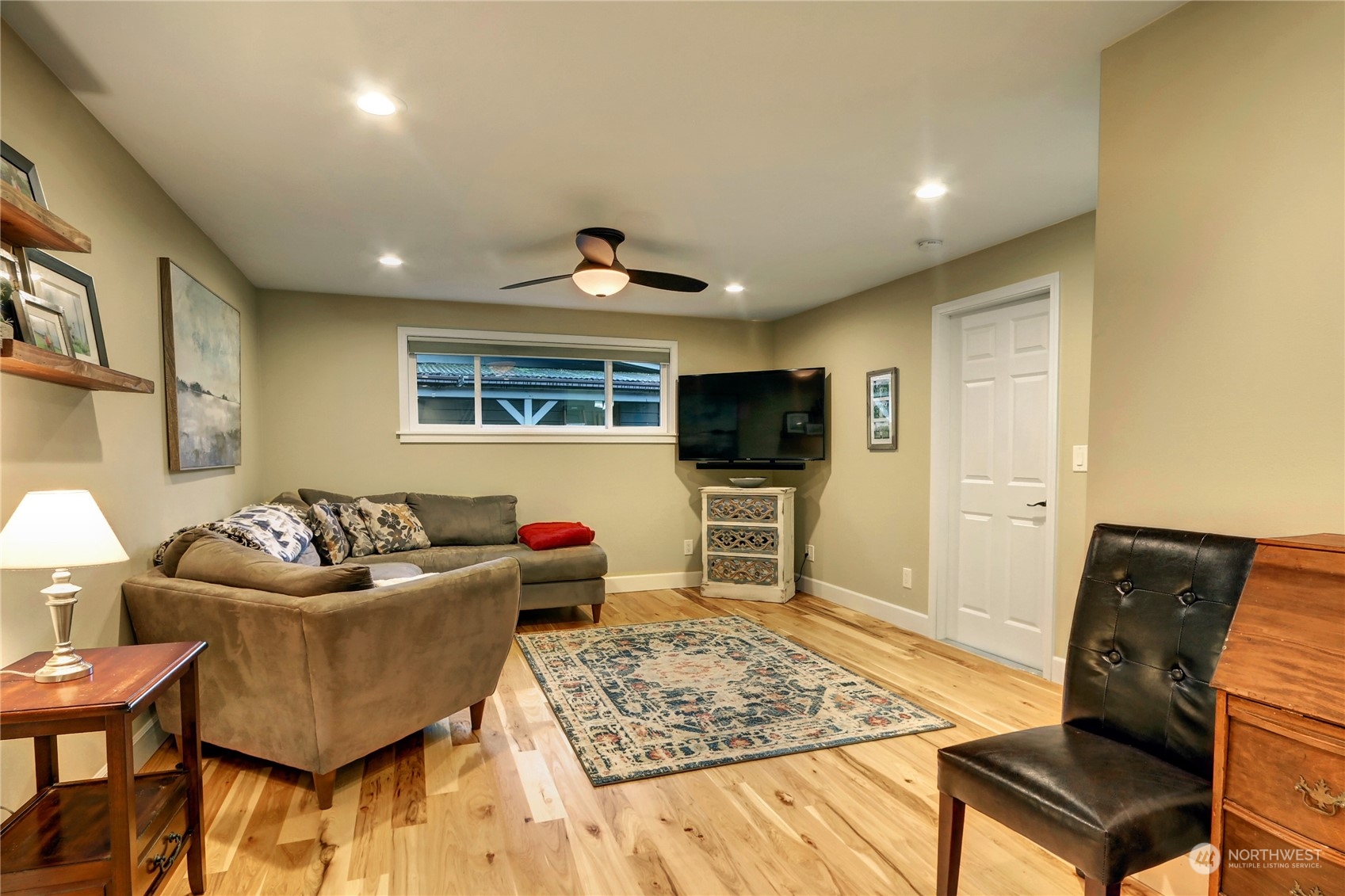 120 219th Place Southwest Bothell, WA 98021 - Photo 5 of 20 a living room with furniture and a flat screen tv