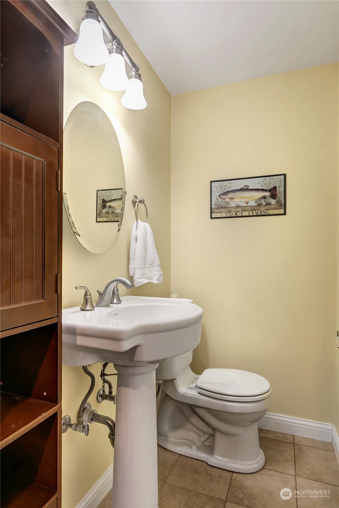 120 219th Place Southwest Bothell, WA 98021 - Photo 6 of 20 a bathroom with a sink a toilet and mirror