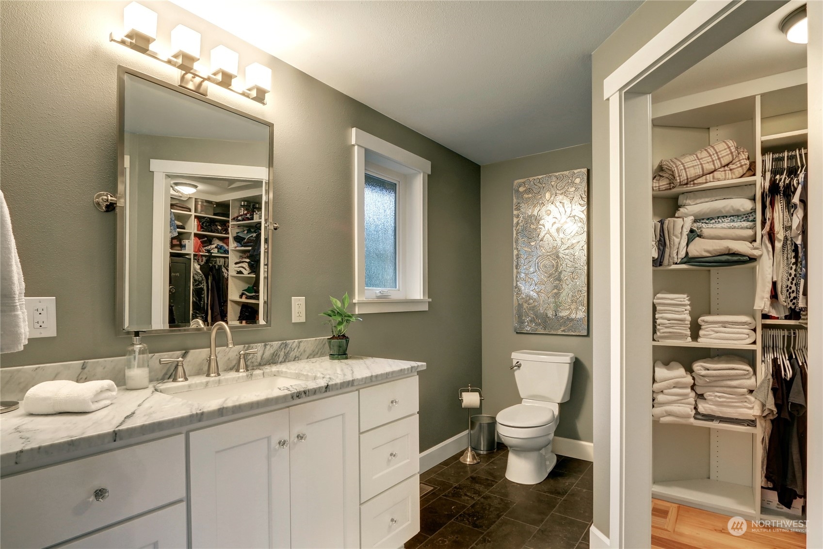 120 219th Place Southwest Bothell, WA 98021 - Photo 10 of 20 a bathroom with a granite countertop toilet sink and shower