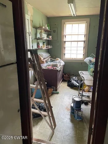 a room with furniture and a window