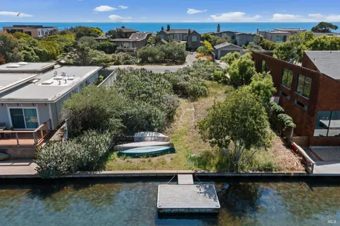 an aerial view of house with yard swimming pool and outdoor seating