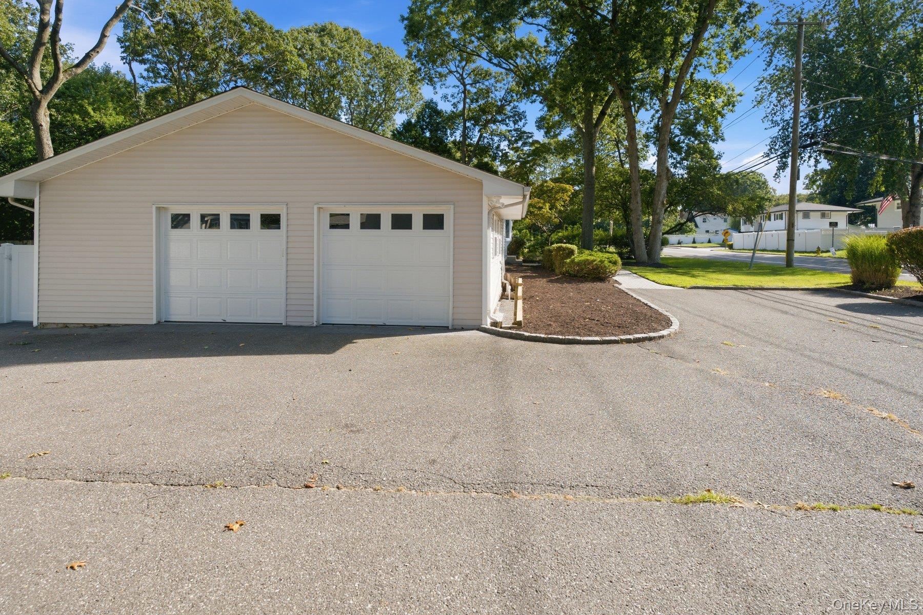 65 Holbrook Road Centereach, NY 11720 - Photo 22 of 28 2-Car Garage