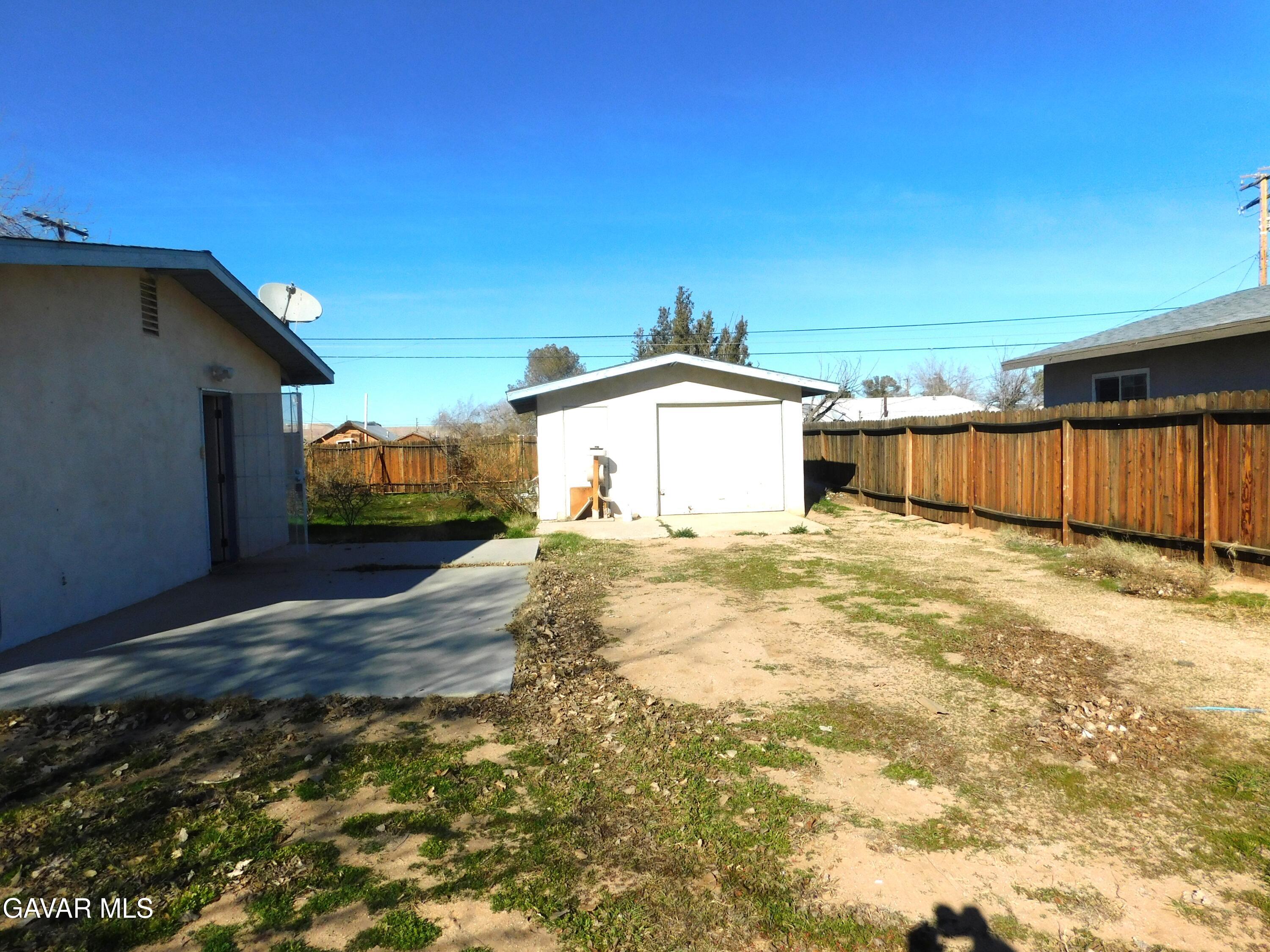 26933 John Street Boron, CA 93516 - Photo 6 of 26 a view of a backyard of a house